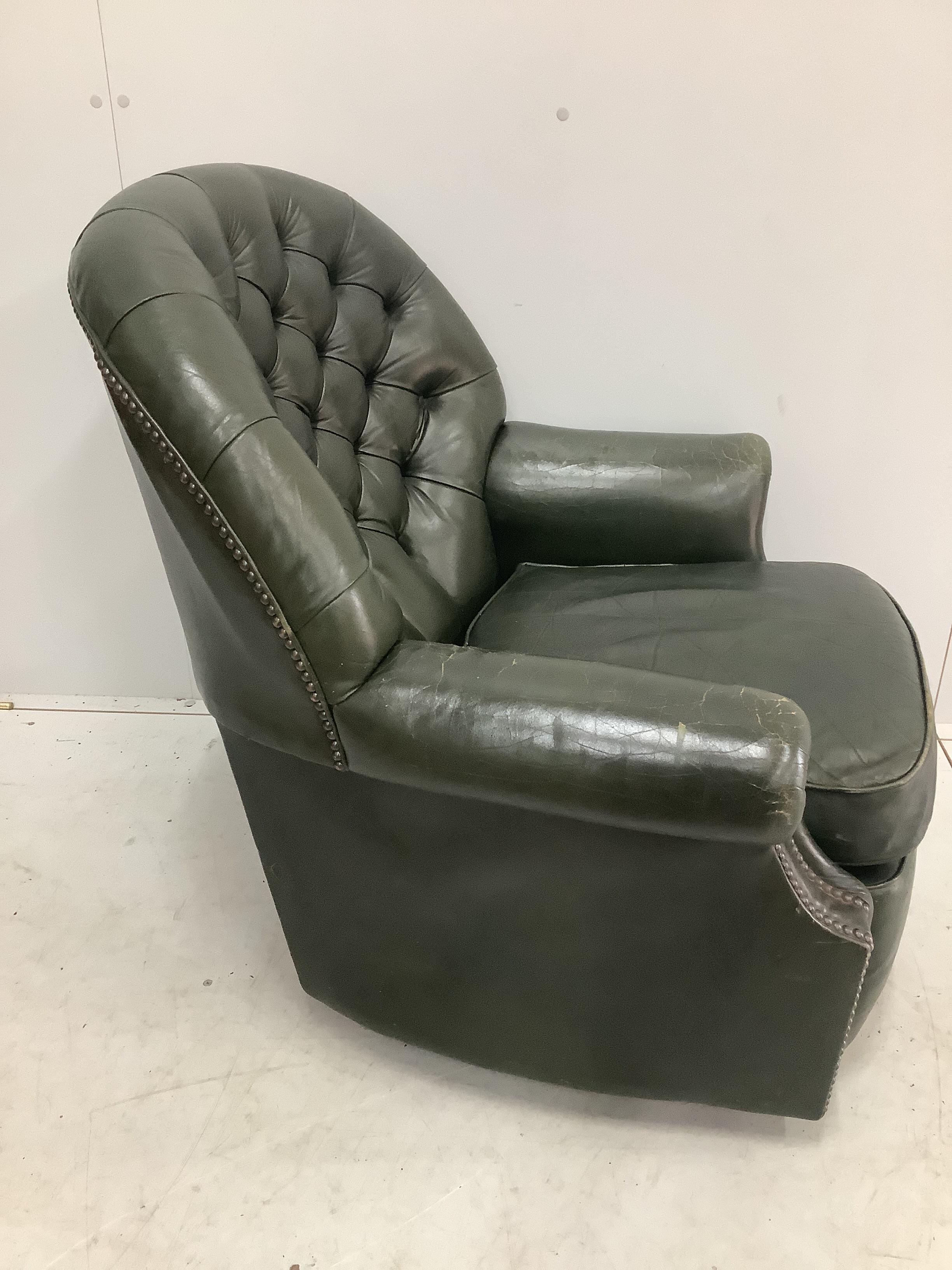 A Pegasus Furniture “Julianna” buttoned green leather club armchair, width 85cm, depth 70cm, height 88cm